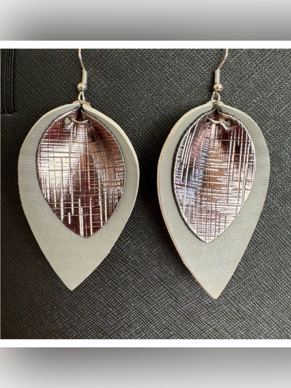 NWT Grey Petal Shaped Faux Leather Earrings.